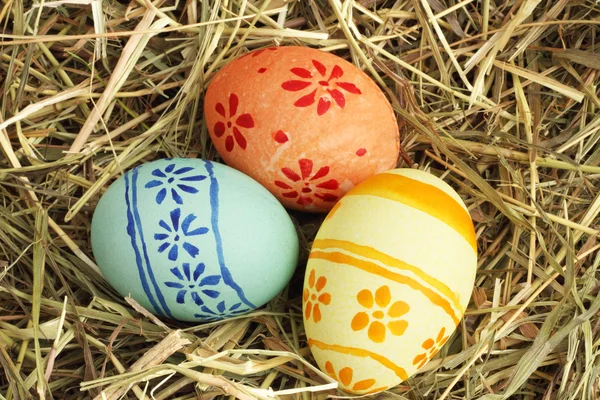Easter eggs on hay — Stock Photo, Image