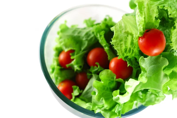 Alface clara e tomate voando conceito de salada — Fotografia de Stock