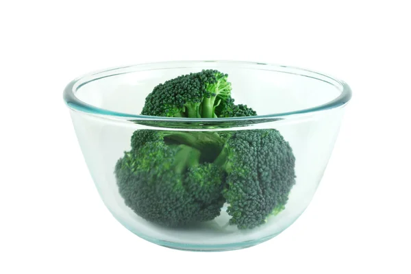 Broccoli pices in transparent bowl — Stock Photo, Image