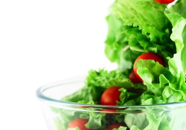 Light lettuce and tomatoes flying salad concept clipart