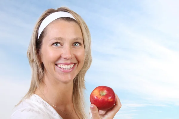 Woman and apple — Stock Photo, Image