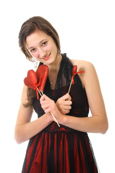 Teenager girl and red hearts — Stock Photo, Image