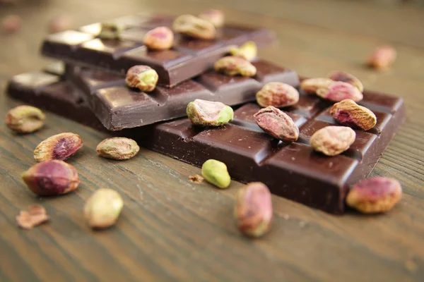 Chocolate and pistachios — Stock Photo, Image