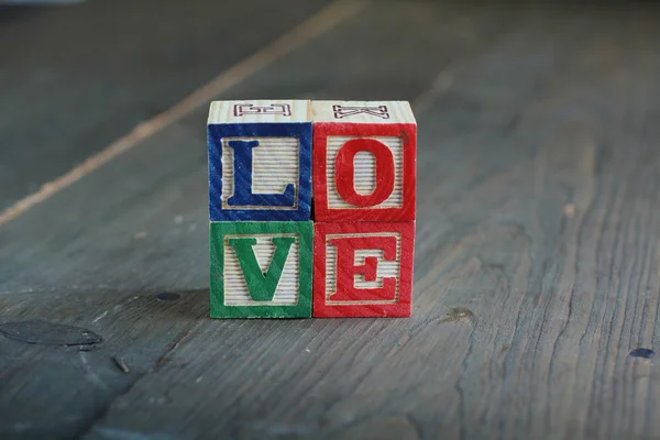 Miłość bloki drewna — Zdjęcie stockowe