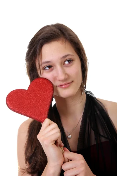 Teenager girl holding a heart — Stock Photo, Image