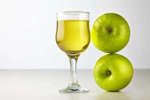 stock image Glass of apple juice isolated on white