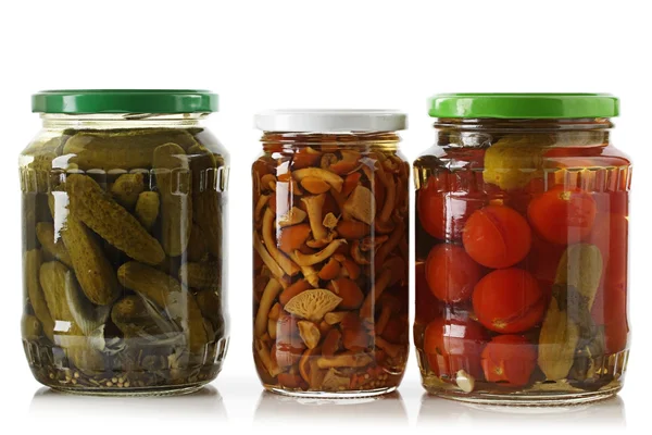 Pickled cucumbers, tomatoes and mushrooms. — Stock Photo, Image