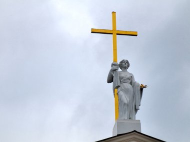 Facade of Vilnius Cathedral - sculpture with cross clipart