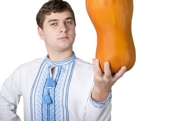 Ukrainian guy with a pumpkin — Stock Photo, Image