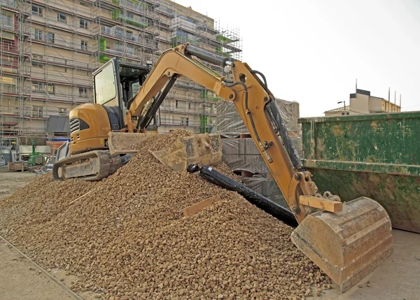 Bulldozer on gravel — Stock Photo, Image