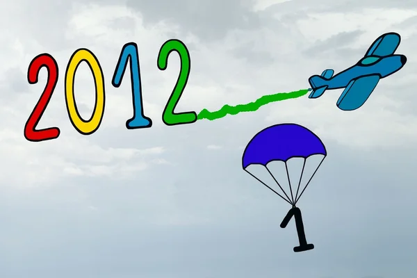 stock image 2012 new year, banner, airplane and parachute