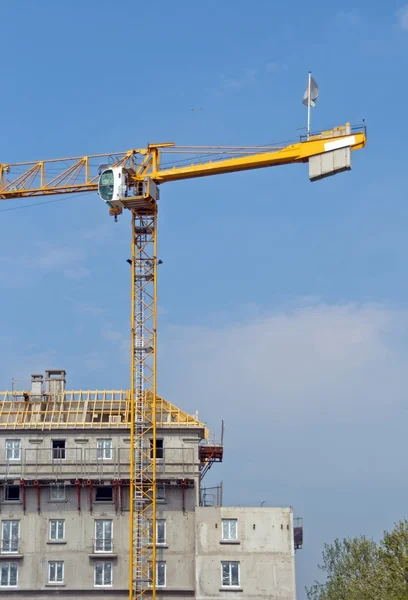 Building in construction and crane — Stock Photo, Image