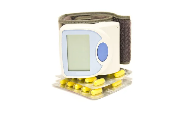 Tonometer and pills — Stock Photo, Image