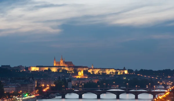 Prague Castle and bridges at sunset — Stock Photo, Image