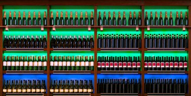 Shelf with wine bottles clipart