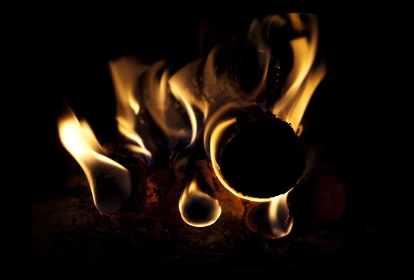 Fire on dark background — Stock Photo, Image