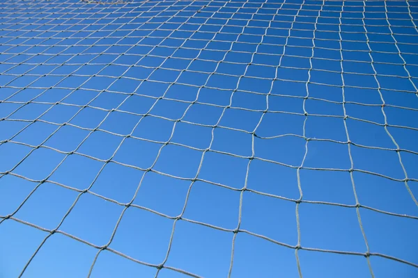 Net på blå himmel — Stockfoto