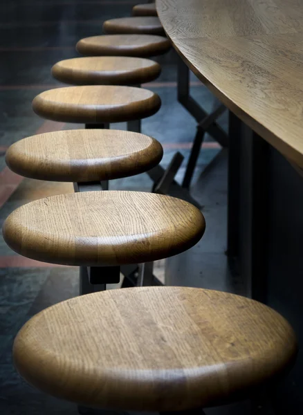Row of empty bar stools — Stock Photo, Image