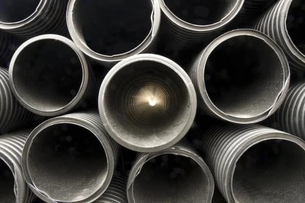 Black plastic pipes — Stock Photo, Image