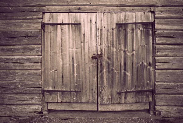 Porta de madeira cinza velho — Fotografia de Stock