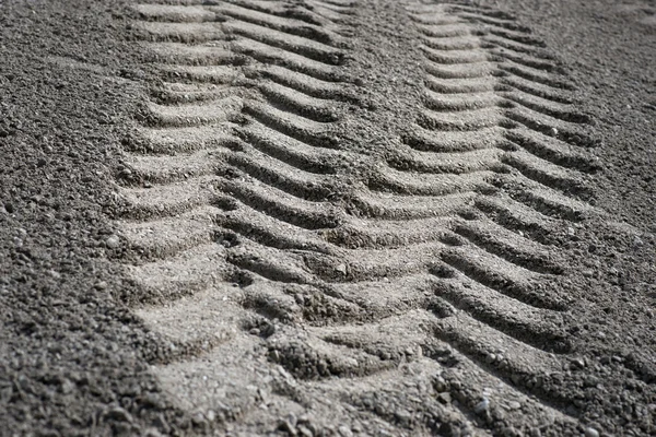 Tire print in sand — Stock Photo, Image