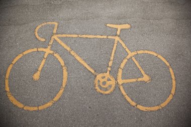 Sign a bicycle path on the pavement clipart