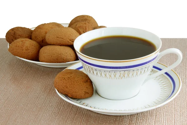 Xícara de café e bolos de chocolate marrom — Fotografia de Stock