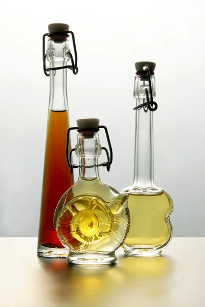 Vodka and brandy in small bottles — Stock Photo, Image