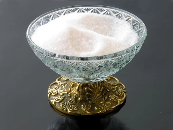 Pote com açúcar cristalino branco — Fotografia de Stock