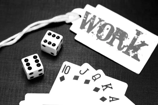 Dices and playing cards on a black background — Stock Photo, Image