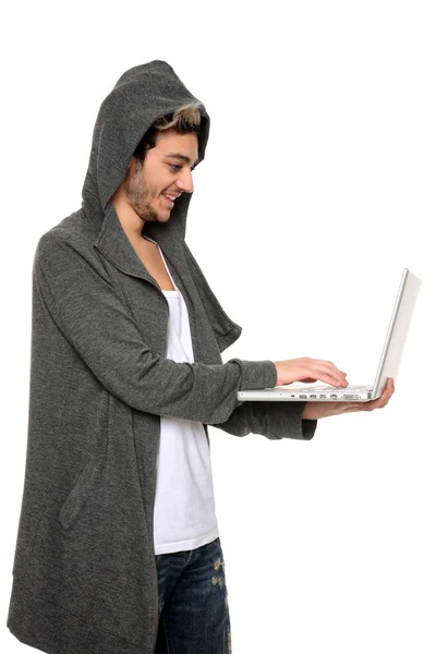 Jonge man met een laptop — Stockfoto