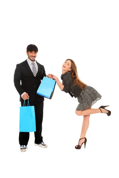 Jovem casal elegante com sacos de compras — Fotografia de Stock