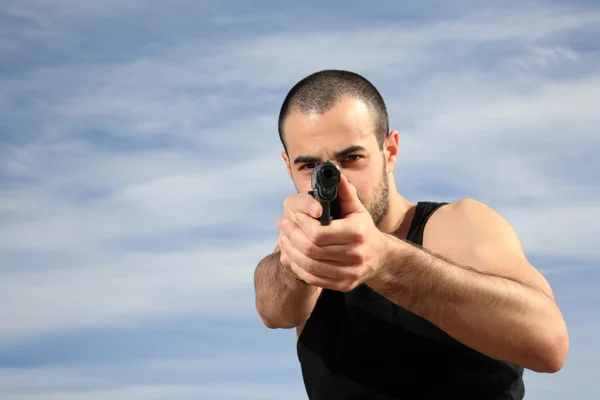 Guarda-costas masculino com uma arma — Fotografia de Stock