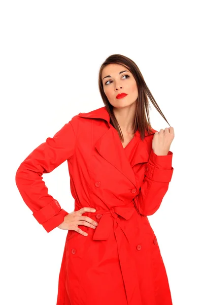 Flicka på en röd kappa — Stockfoto