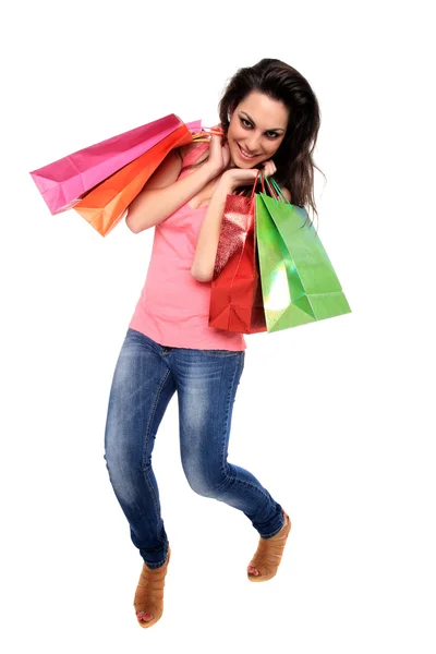 Portret van een jong meisje met shopping tassen — Stockfoto