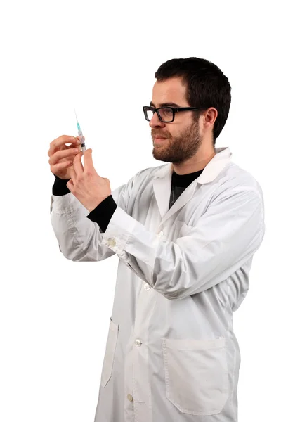 Lékárník držící injekci — Stock fotografie
