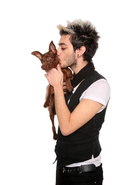 Young man with pinscher — Stock Photo, Image