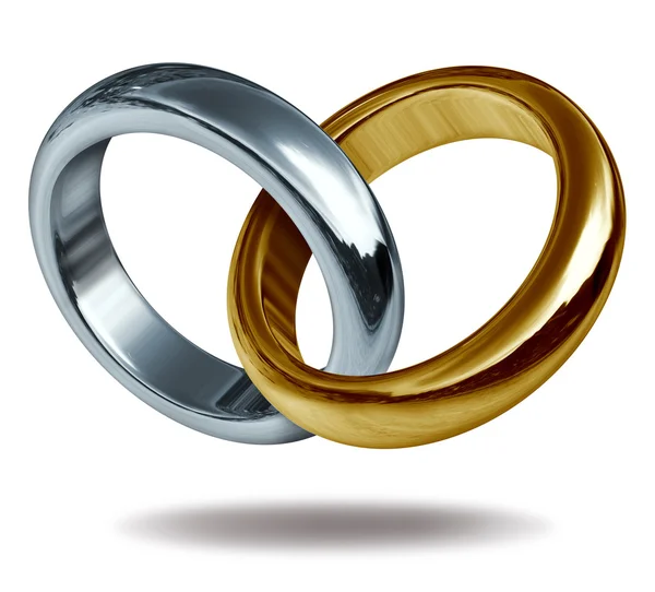 Miłość pierścienie tytanu i złota kształt serca — Zdjęcie stockowe