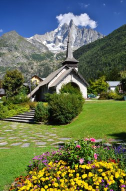 Les Praz de Chamonix and Aiguille Dru mountain clipart