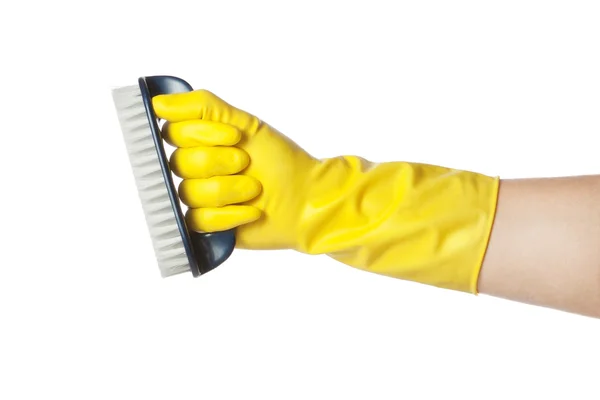 Hand in glove with a brush. On a white background. — Stock Photo, Image