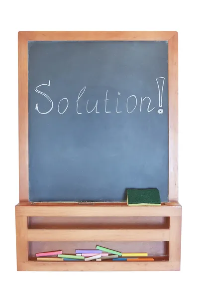 Lösning-skriva på tavlan med krita. — Stockfoto