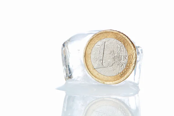 stock image Frozen coin euro. Times of crisis.