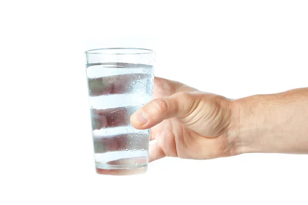 A glass of pure water in hand. — Stock Photo, Image