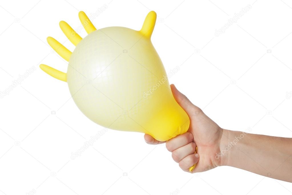 Hand holding inflated glove. On a white background.