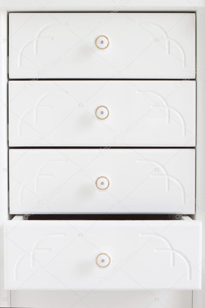 White wooden drawers.