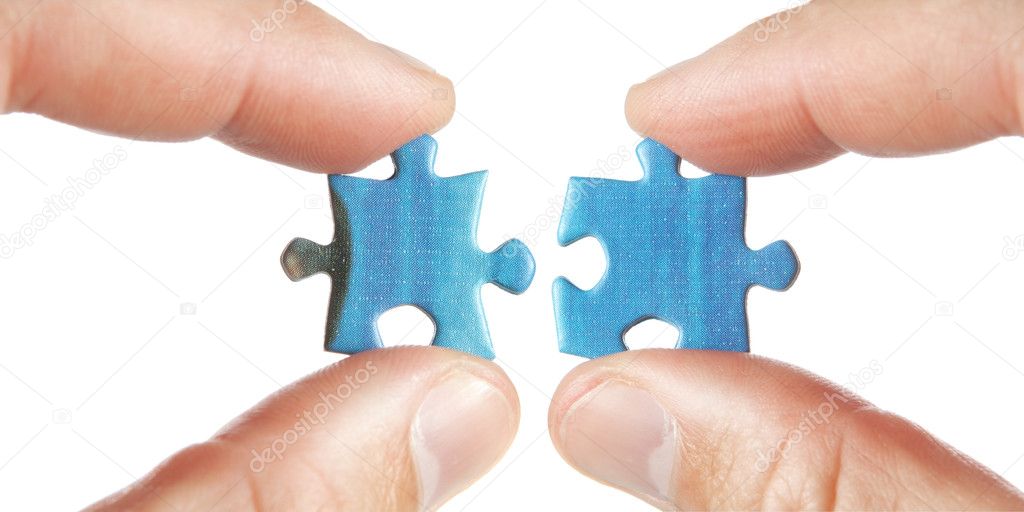 Connecting two puzzles. On a white background.