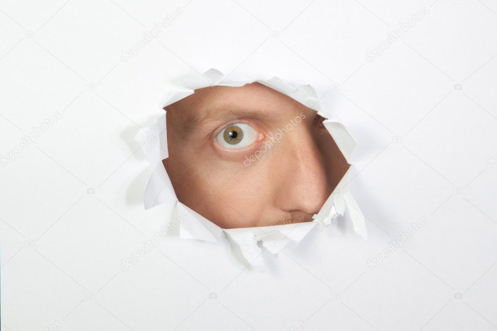 A secret look through the hole in the paper.