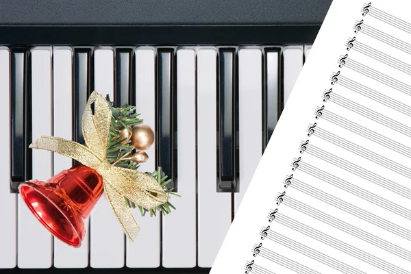 Christmas bell on keyboard — Stock Photo, Image