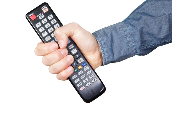Remote for tv clamped in the hand — Stock Photo, Image