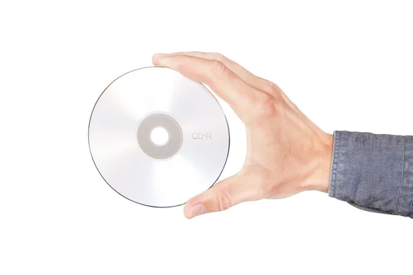 Le disque cd en main. sur un fond blanc. — Photo